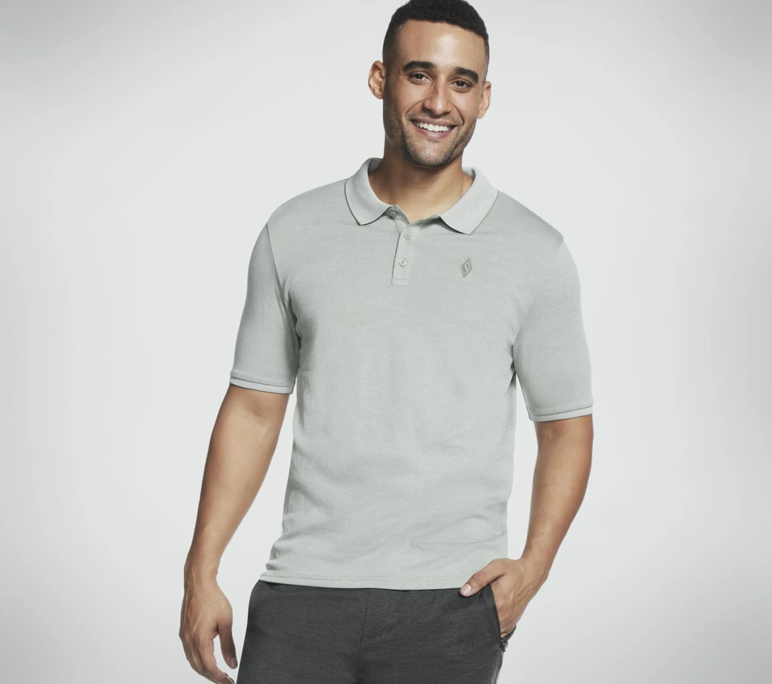skechers_apparel_off_duty_0.webp SKECHERS Apparel Off Duty Polo Shirt CINZENTO CLARO / VERDE Shop
