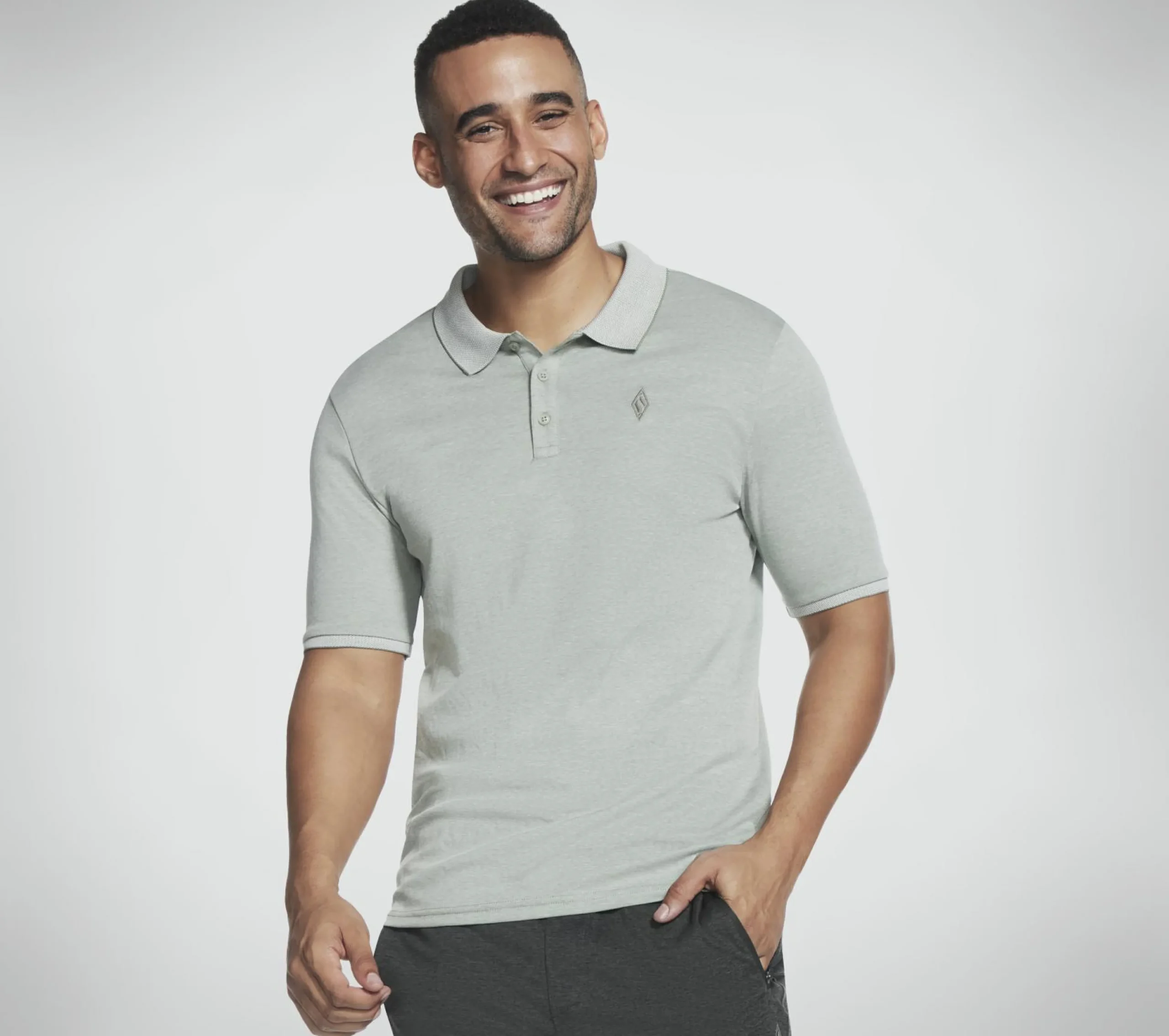 skechers_apparel_off_duty_2.webp SKECHERS Apparel Off Duty Polo Shirt CINZENTO CLARO / VERDE Shop